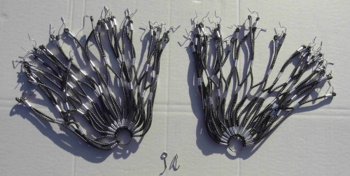 Kleidernetz Rockschutz Gummi, schwarz-silber marmoriert, 26-28