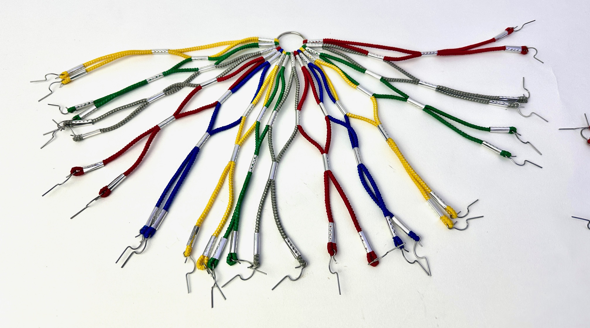 Kleidernetz Rockschutz Gummi, bunt, 26-28