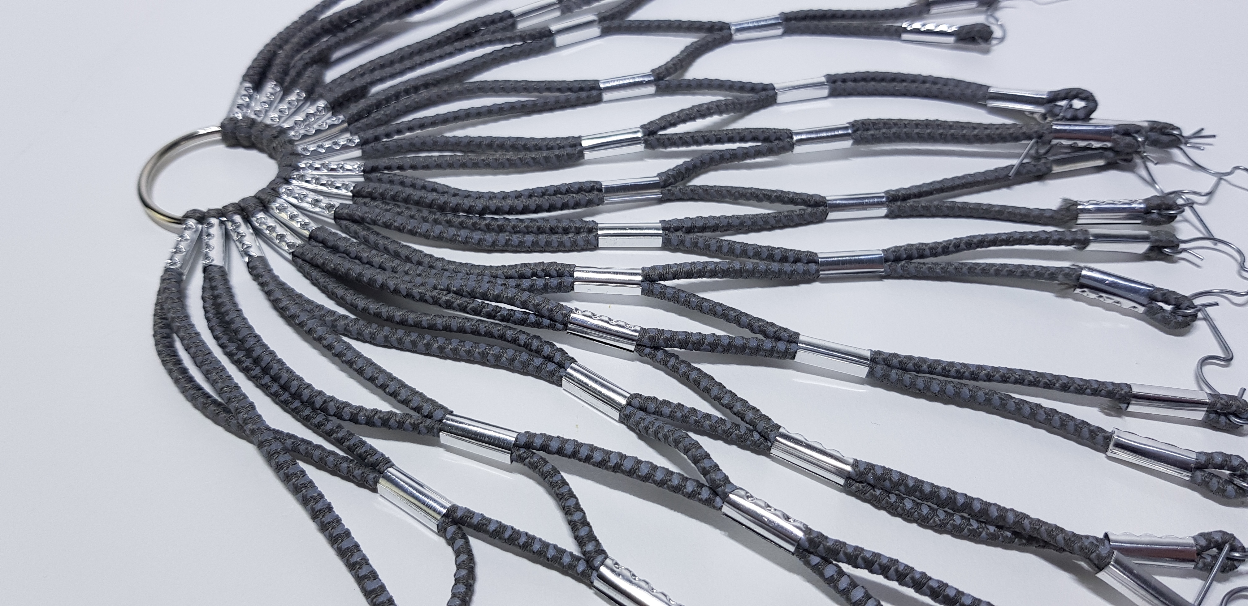 Kleidernetz Rockschutz Gummi, grau, reflektierend, 26-28
